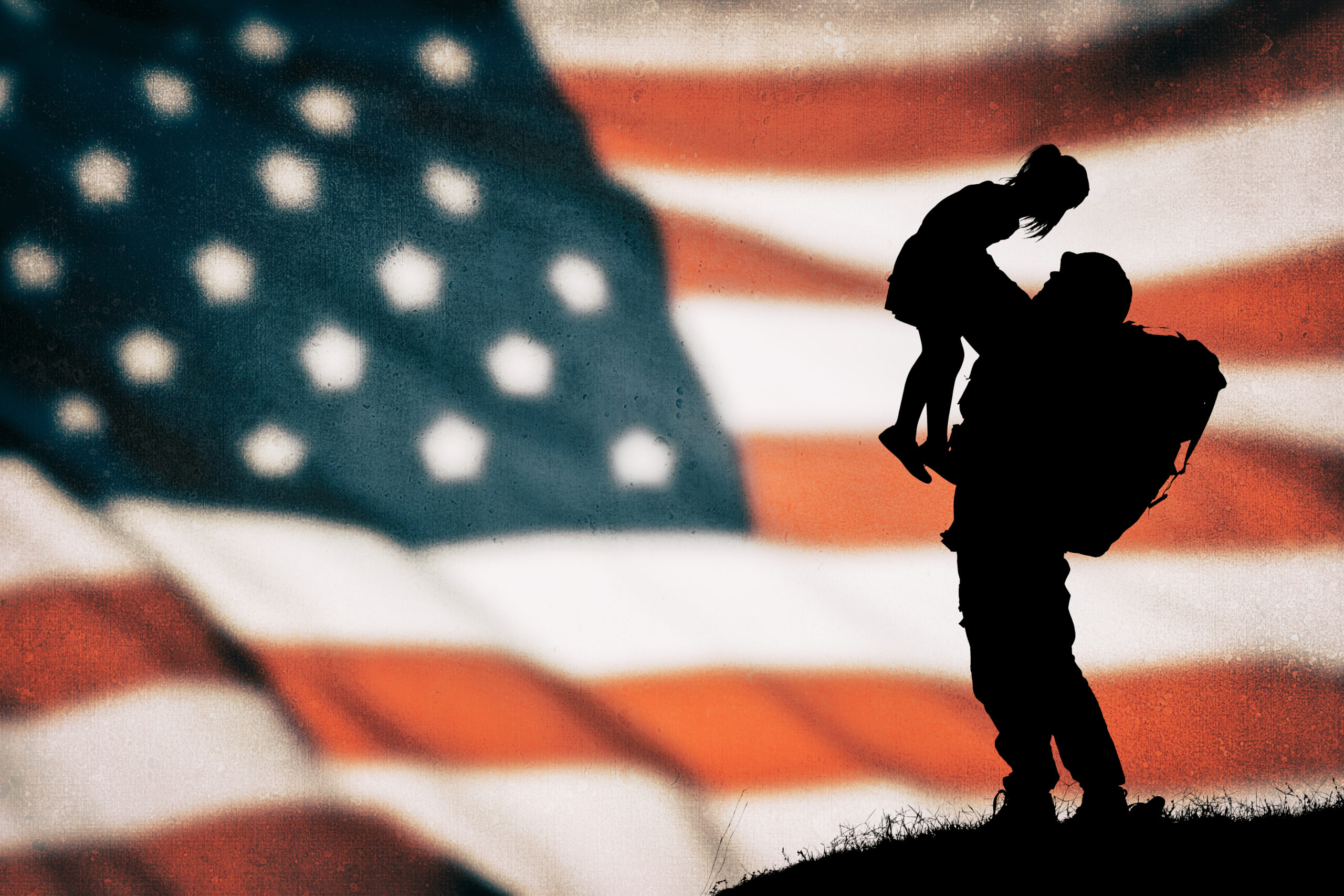 Silhouette of a soldier returning to reunite with his daughter