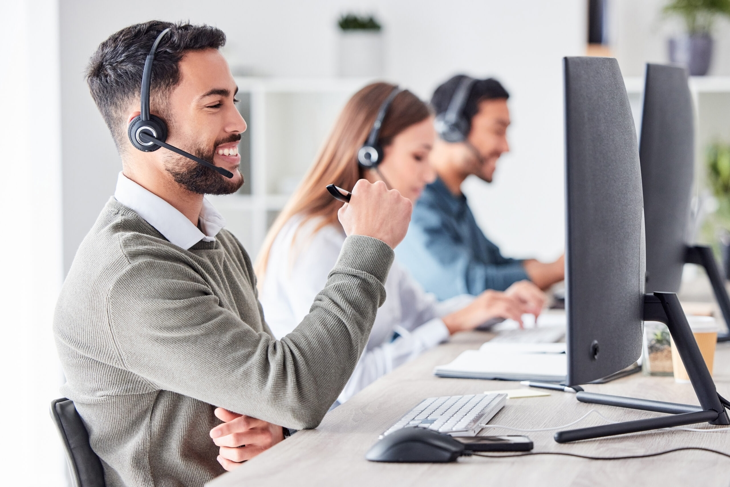Joyful workers in a call center