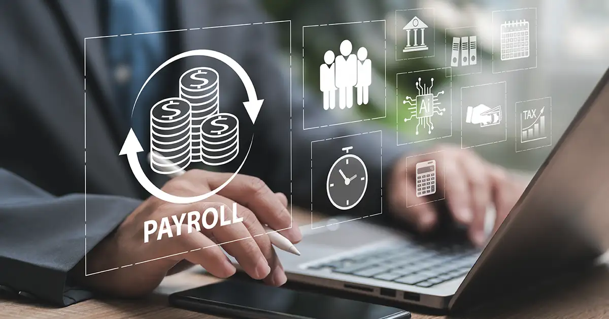 image of hands at a keyboard with holographic payroll displayed