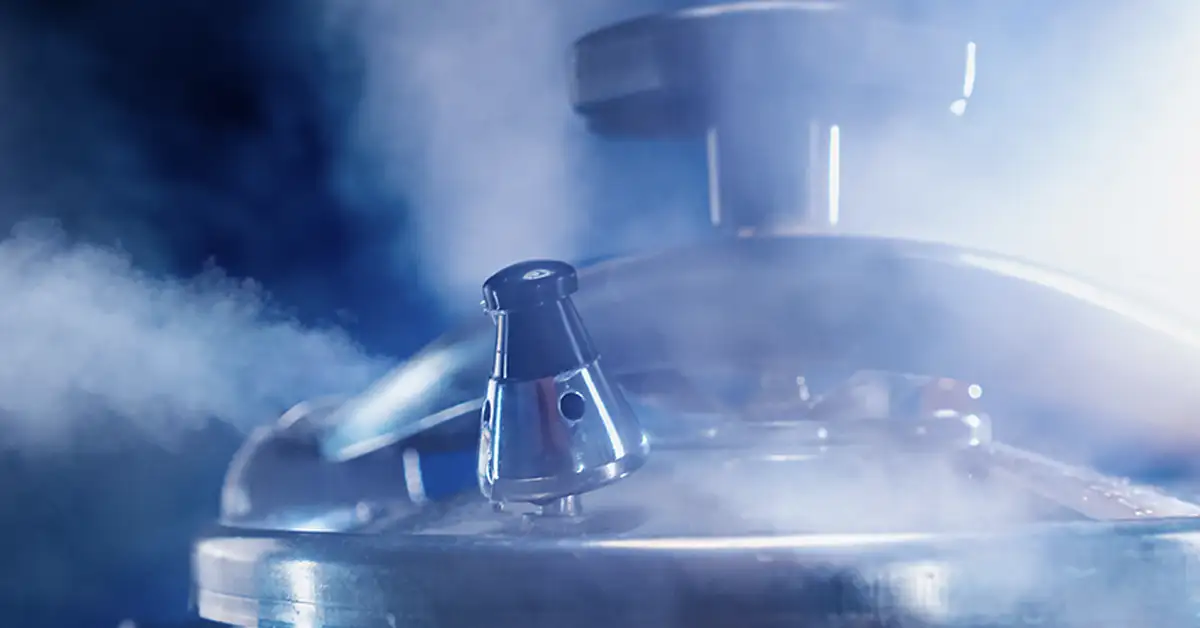close-up image of a pressure cooker emitting steam