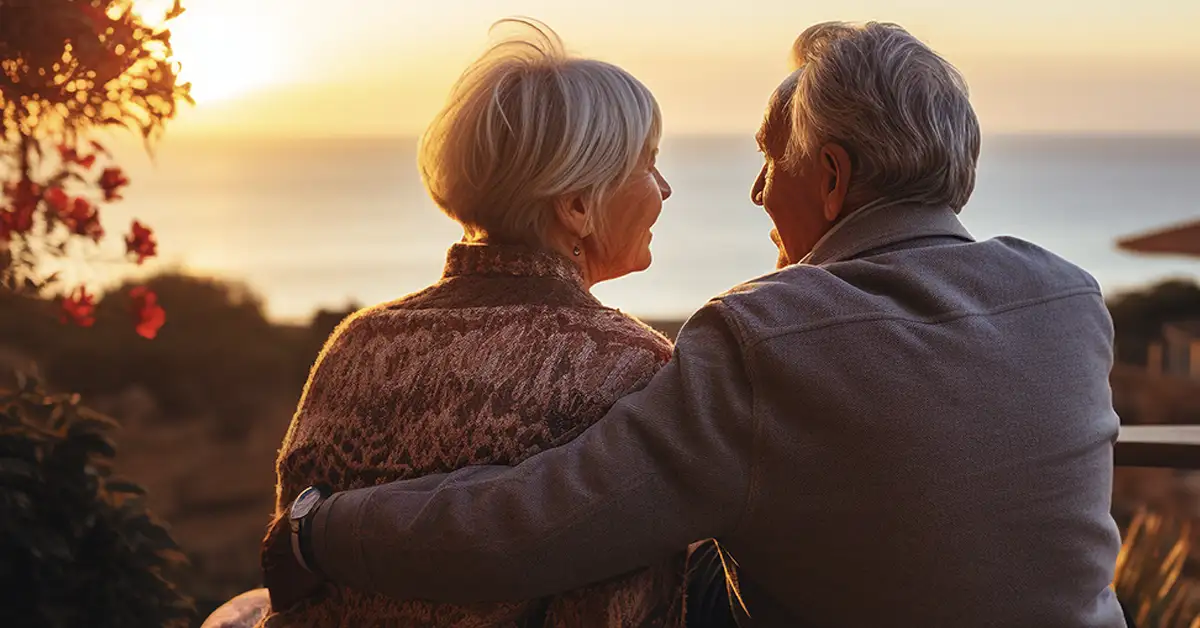image of elderly retiree couple watching the sunset