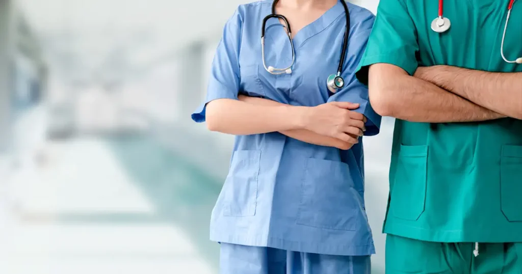 image of two medical professionals in scrubs