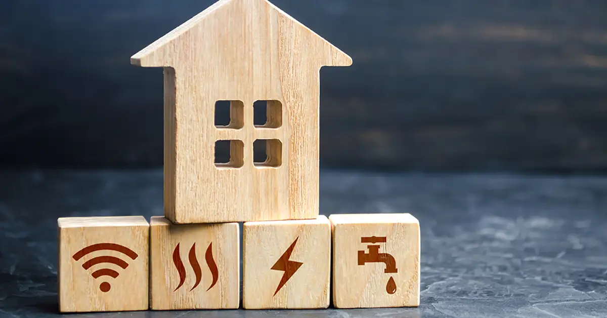 image of wooden blocks with household utilities on them