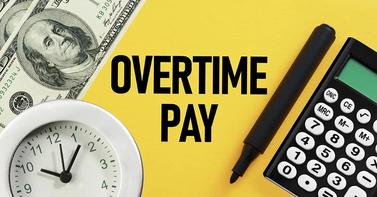 image showing text of overtime pay with money, a clock and a calculator
