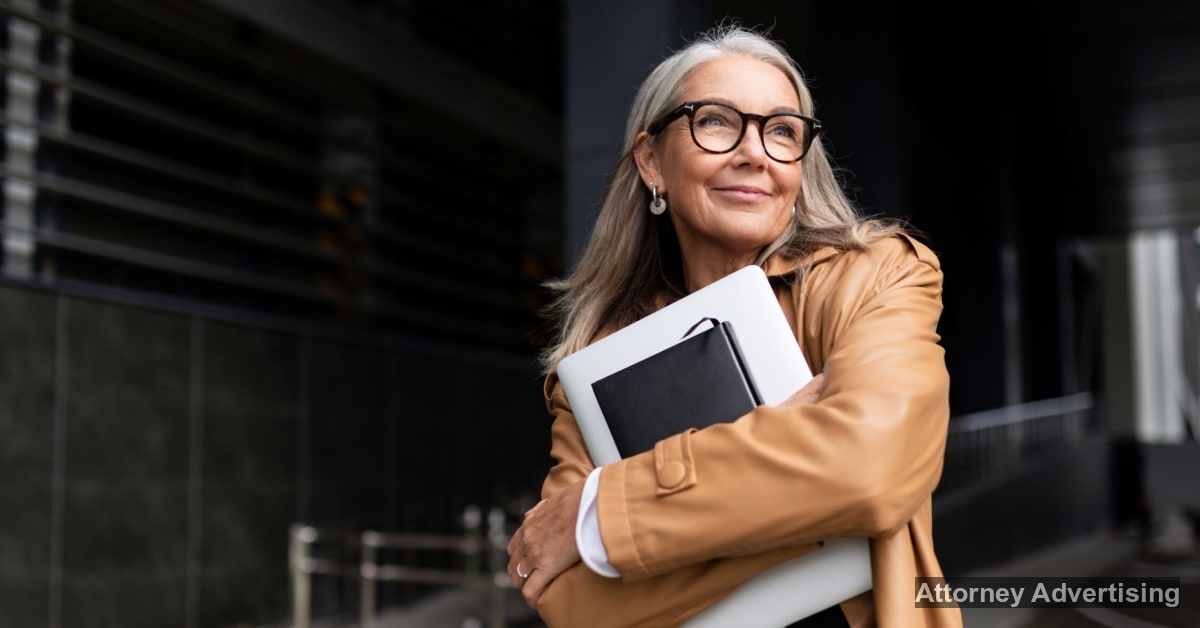 image of a woman holding books